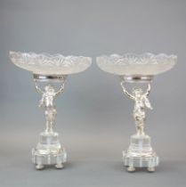 A pair of cut glass, silvered metal and crystal centerpiece bowls, H. 34cm, dia. 24cm.