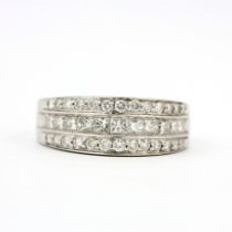 An 18ct white gold ring set with princess and brilliant cut diamonds, overall 1ct, (M.5).