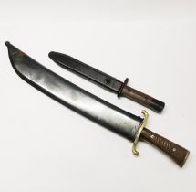 A bayonet and a machete, L. 55cm.