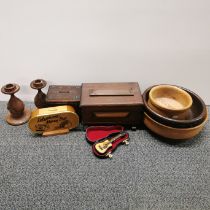 A quantity of turned wooden items.