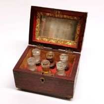 A hardwood perfume mixing box inlaid with brass, size 13 x 9 x 9cm.