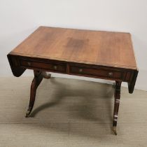 An inlaid mahogany drop leaf two drawer desk/ table extended 150 x 75 x 66cm.