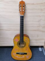 A 1960's classical acoustic guitar.