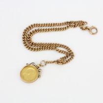 A hallmarked 9ct rose gold albert chain with a 9ct gold mounted half sovereign pendant, chain L.