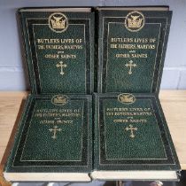 Four volumes of Butler's lives of the fathers, martyrs and other saints. Published c. 1926.