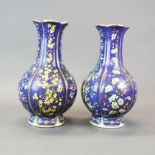 A pair of Chinese porcelain vases with four character mark to base, H. 27cm.
