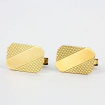 A boxed pair of hallmarked 9ct yellow gold cufflinks, face L. 1.5cm.