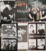 A large collection of music and other posters including Ryan Adams, The Robert Gray Band, Baby