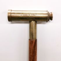 A brass telescope handled walking stick, handle length 12cm, stick length 94cm.