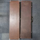 A group of two useful cases, 86 x 24 x 8cm.