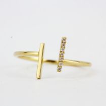 An 18ct yellow gold diamond set ring, (P.5).