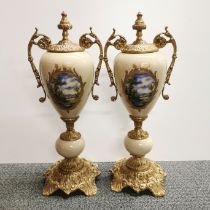 A pair of gilt metal mounted porcelain garnitures, H. 47cm.