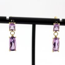 A pair of 9ct yellow gold droop earrings set with fancy cut amethysts, L. 2.5cm.
