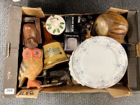 A box of mixed ceramic, wooden and metal items.