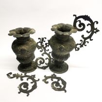 A pair of early hand hammered metal urns, H.23cm.