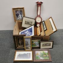 A box of mixed pictures and barometer.