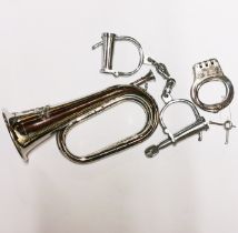 Two pairs of reproduction handcuffs and bugle.