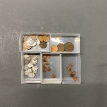 A quantity of silver coins, quarter farthings etc.