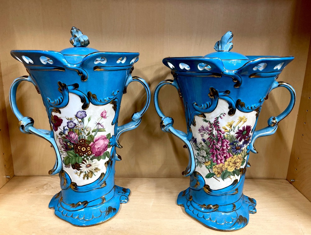 A pair of Continental porcelain pot pourri and covers, H. 38cm.