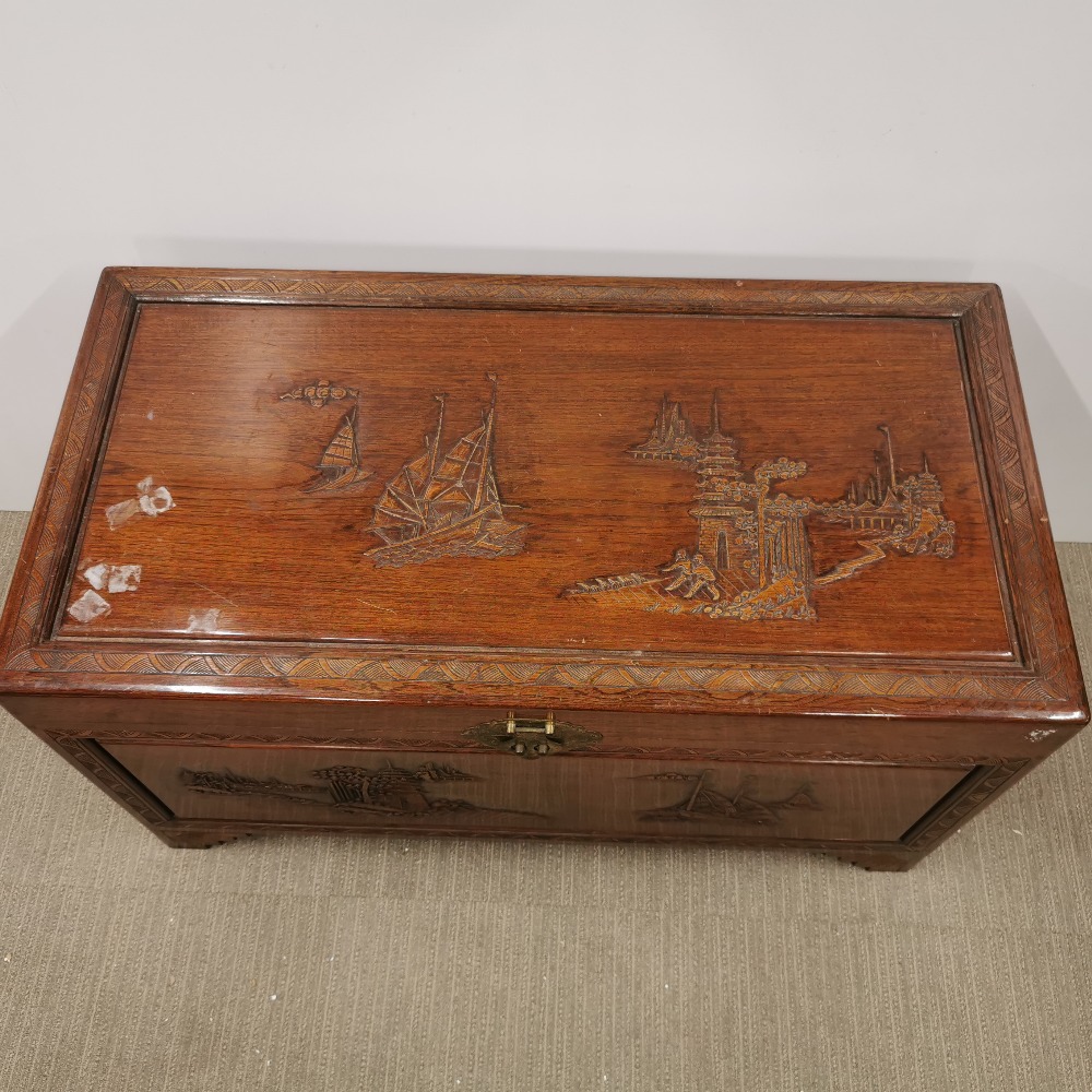 An oriental carved hardwood blanket box with brass decoration and hinges, some stains to top, 105 - Image 2 of 8