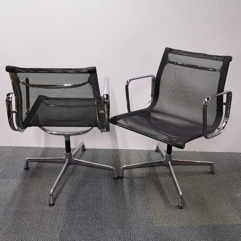 A pair of revolving Eames Vitra type chrome desk chairs, H. 82cm. - Image 3 of 5