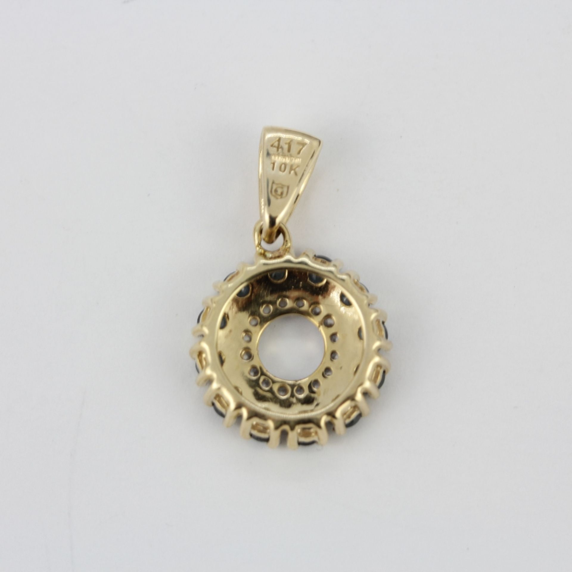 A 10ct yellow gold (stamped 10K) pendant set with London blue topaz and diamonds, L. 2cm. - Image 3 of 3