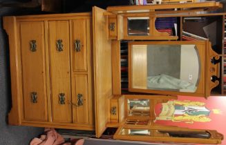 An elegant Edwardian satinwood dressing table, W. 99cm, H. 177cm.