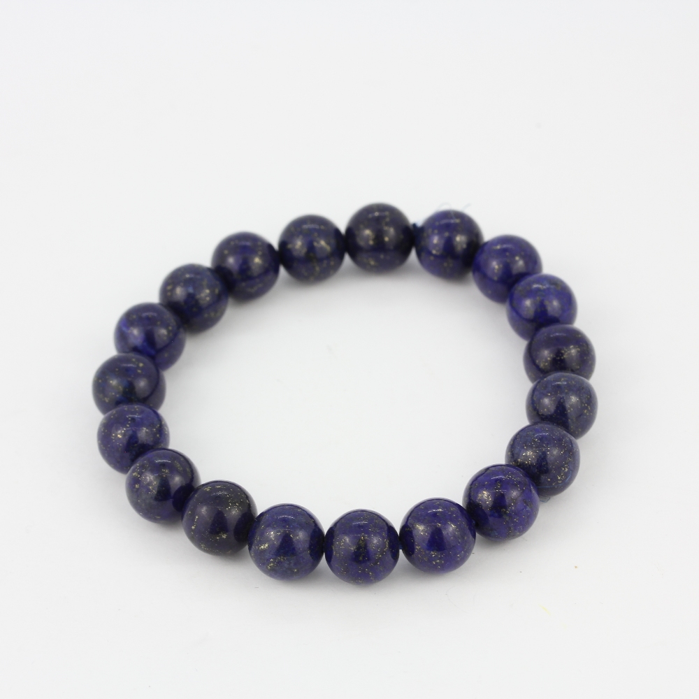 A lapis lazuli beaded expandable bracelet, bead L. 1cm.