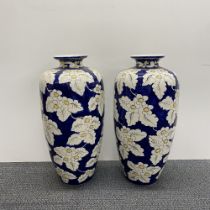 A large pair of handpainted porcelain vases, H. 59cm.