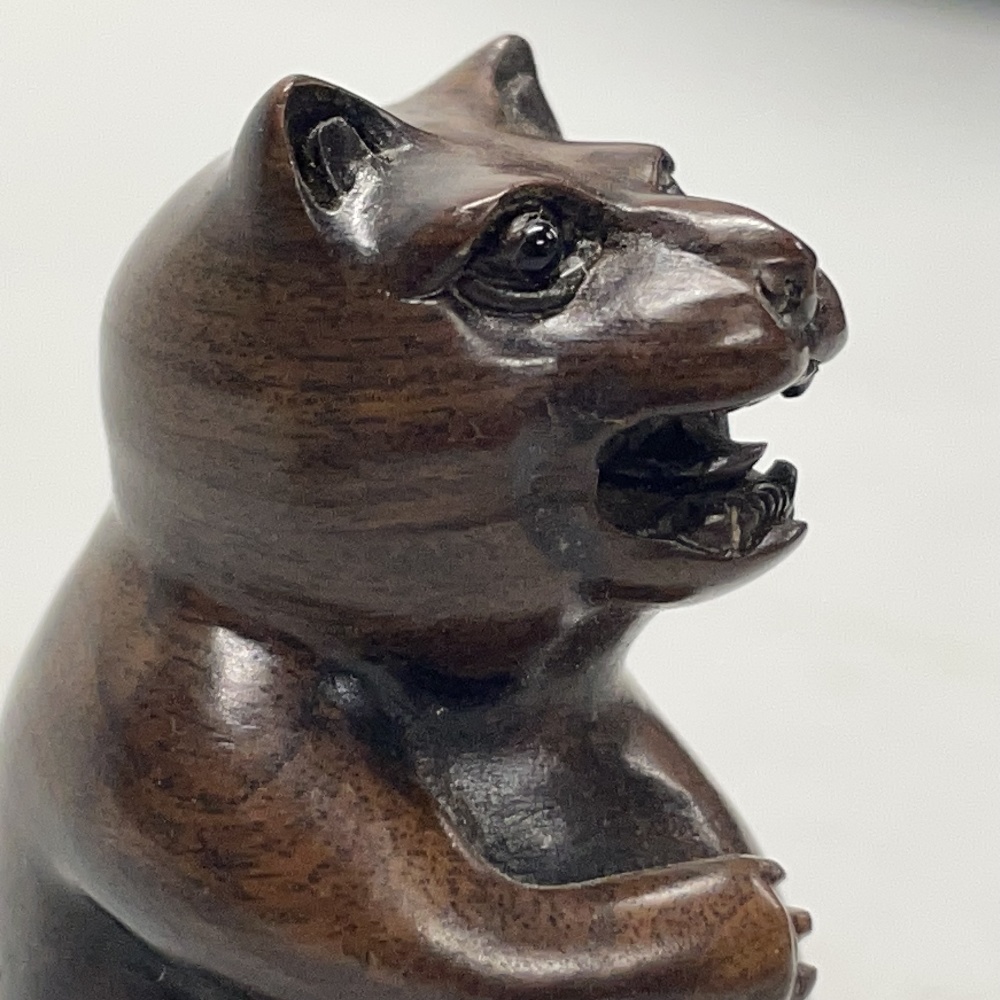 A Chinese carved wooden netsuke of a monkey, together with a further carved wooden netsuke of a cat, - Image 3 of 4
