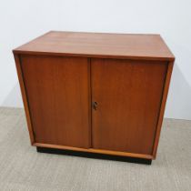 A six section 1970's teak record cabinet with Dynatron Radio Ltd sticker to back, 61 x 54 x 43cm.