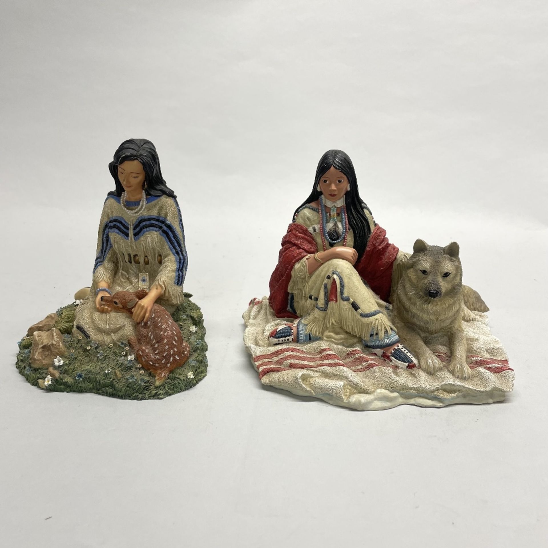Two Hamilton collection figures of Native American women with animals, H. 15cm.