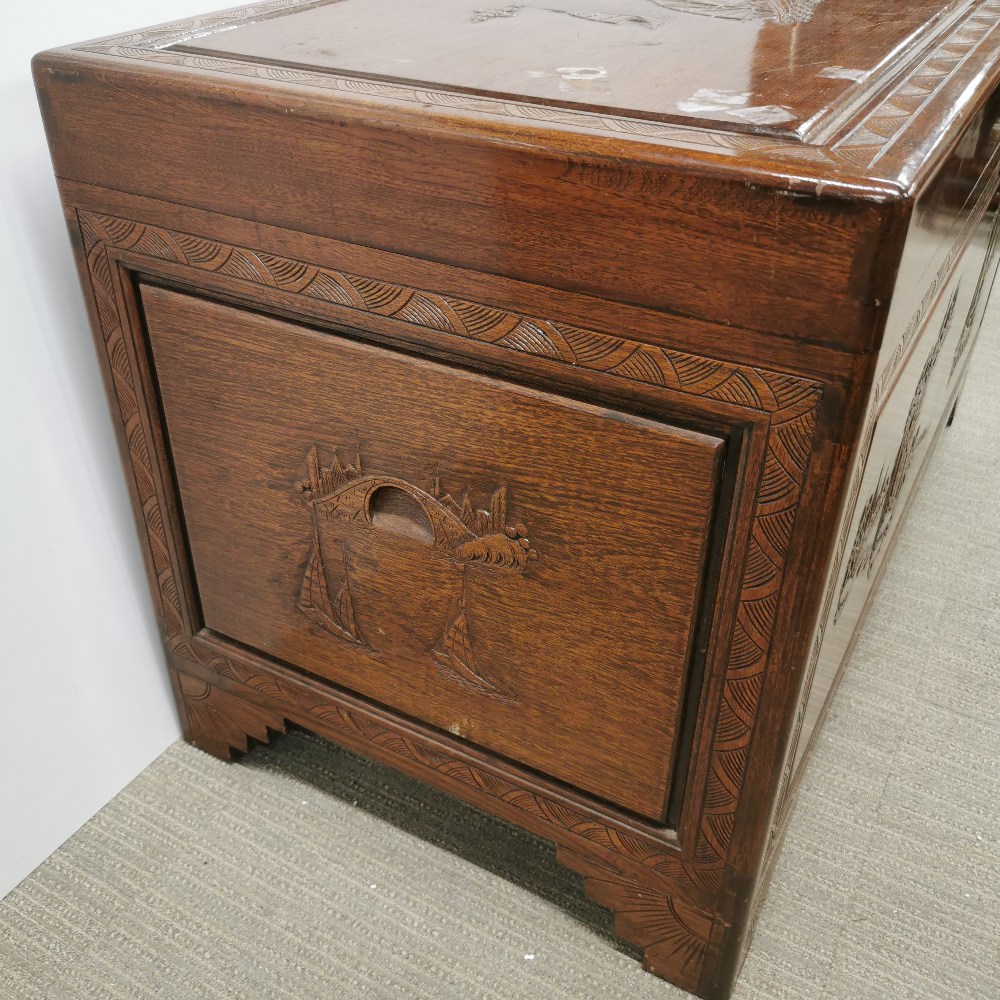 An oriental carved hardwood blanket box with brass decoration and hinges, some stains to top, 105 - Image 5 of 8