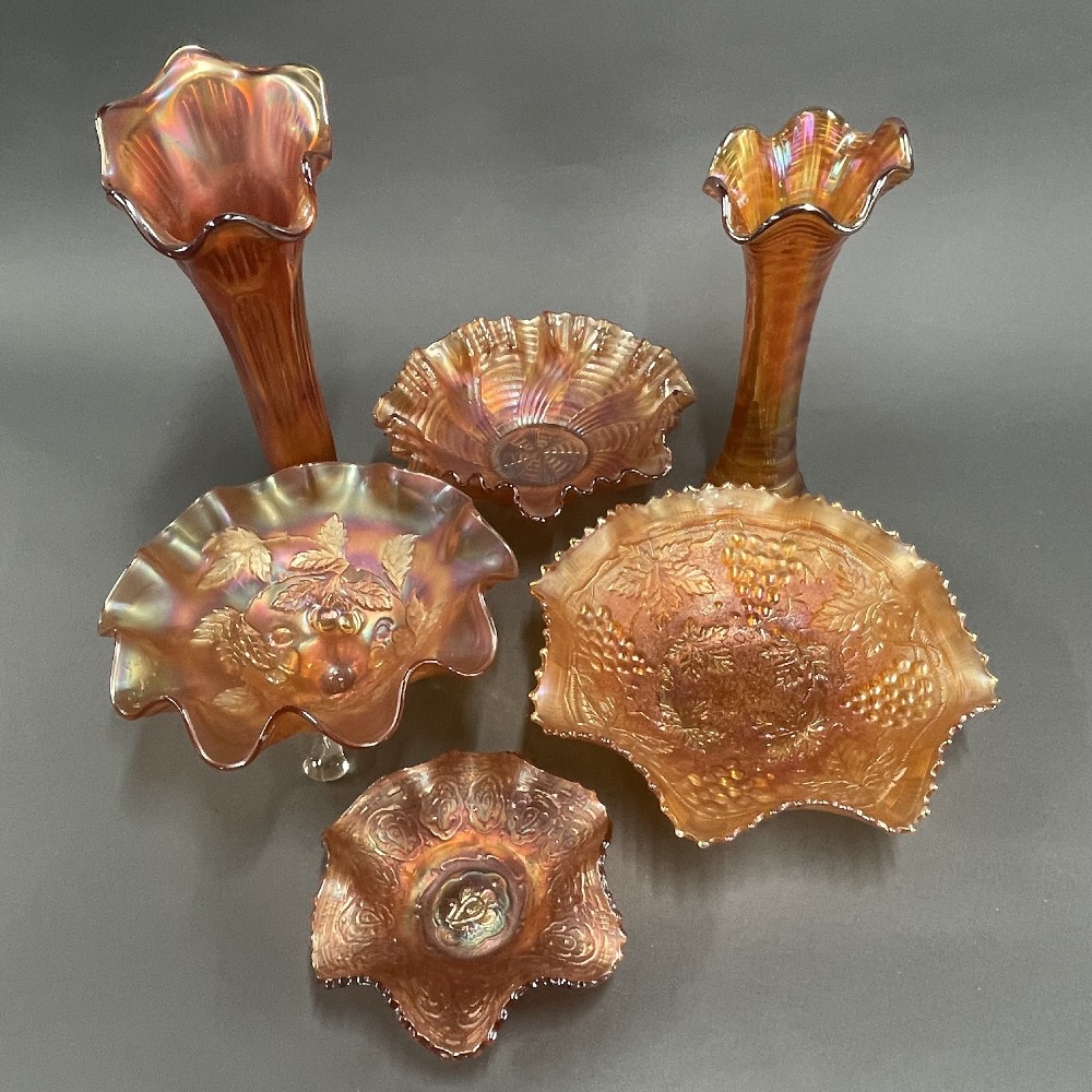 A group of carnival glass items.