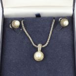 An 18ct white gold and silver Effy necklace with a pearl set pendant, L. 44cm ,with matching stud
