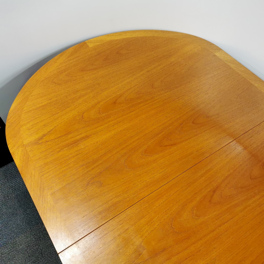 A 1970's Nathan extending teak dining table, H. 73.5cm, W. 104cm. Unextended L. 164cm, extended L. - Image 4 of 8