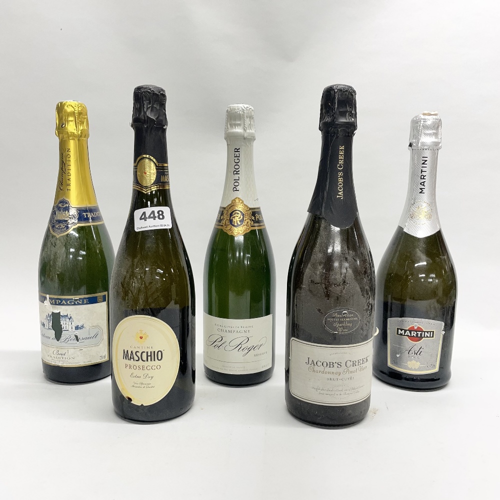 Five bottles of vintage and contemporary champagne and sparkling wine.