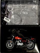 A boxed Minichamps Kawasaki motorcycle model.