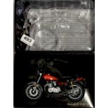 A boxed Minichamps Kawasaki motorcycle model.