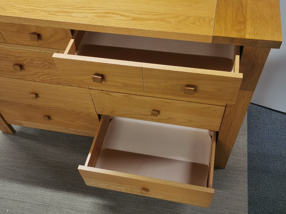 A heavy quality light oak eight drawer sideboard/ chest, 138 x 92 x 52cm. - Image 4 of 4