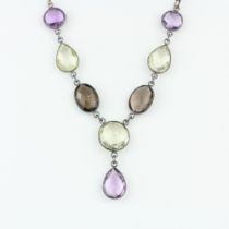 A silver necklace set with checkerboard cut citrines, amethyst and smokey quartz, L. 45cm.