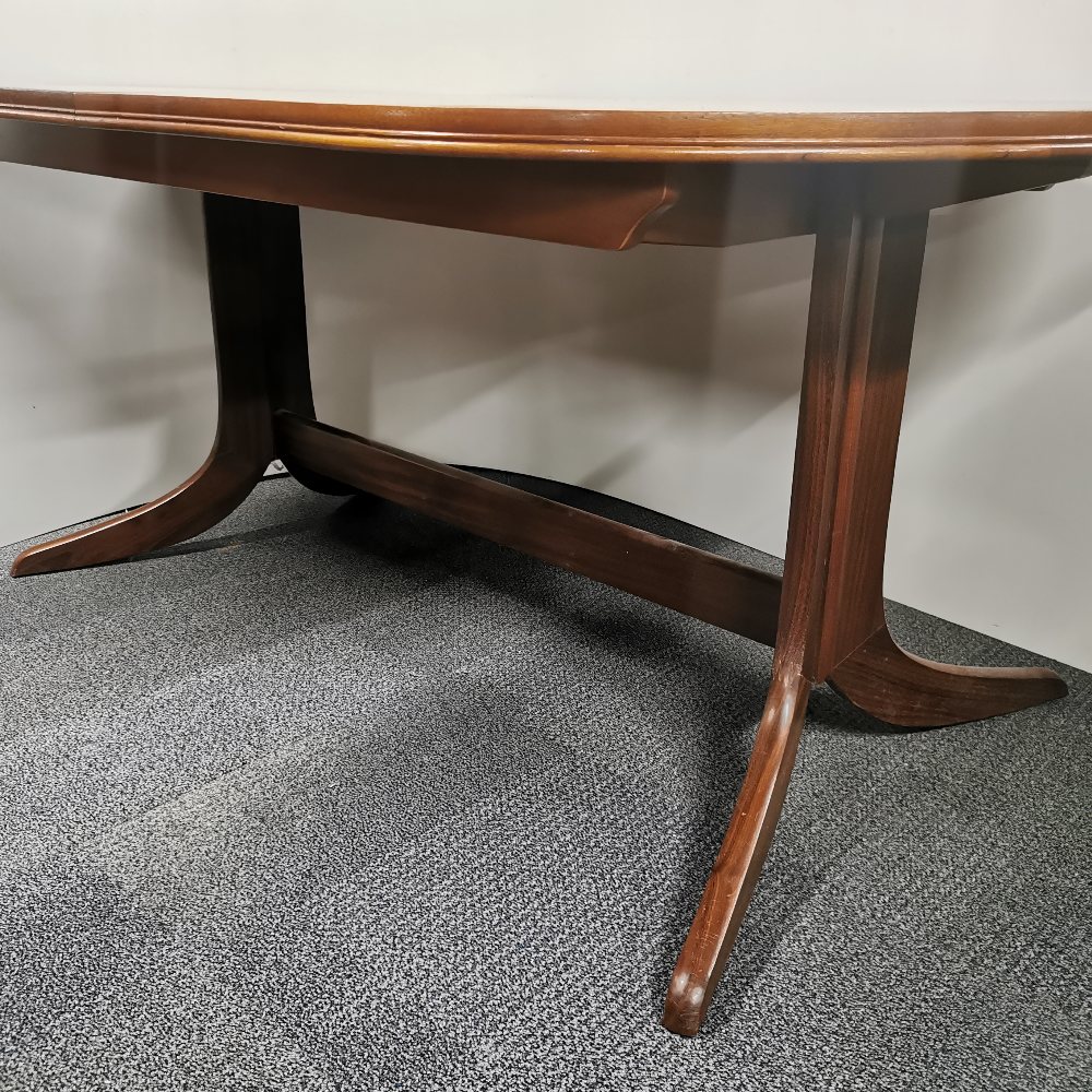 A 1970's Nathan extending teak dining table, H. 73.5cm, W. 104cm. Unextended L. 164cm, extended L. - Image 5 of 8