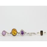 Five 925 silver stone set rings including amber, amethyst and smokey quartz.