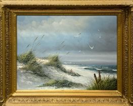 A large gilt framed oil on canvas coastal scene, frame size 66 x 84cm.