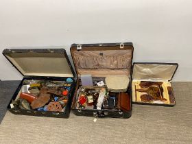 A quantity of leather cases and travel items.