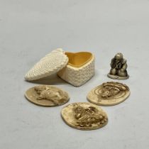 A group of three Chinese bone deity icons, together with a further celluloid box and figure, icon H.