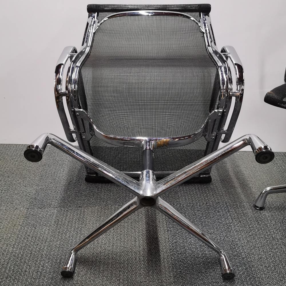 A pair of revolving Eames Vitra type chrome desk chairs, H. 82cm. - Image 4 of 5