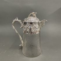 A cut crystal and silver plated water jug, H. 27.