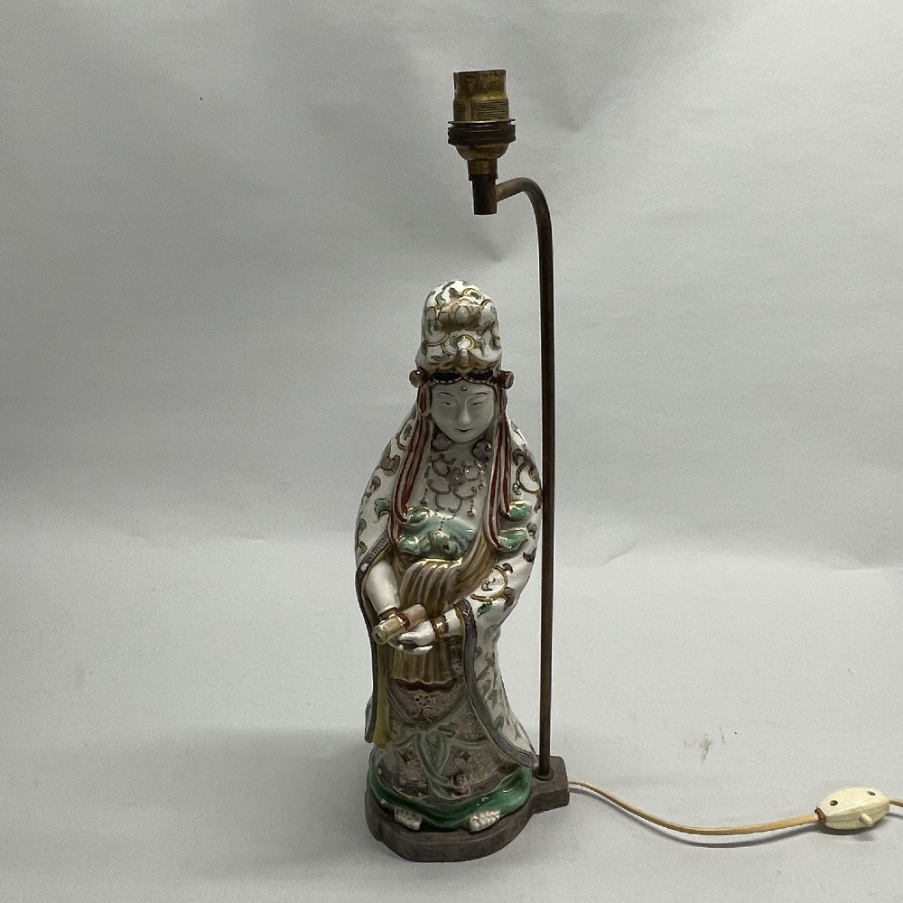A 19thC Japanese Kutani figure of Kanon (Guanyin) standing on a separate table lamp base, figure