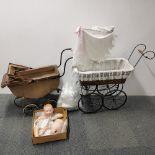 Two vintage prams together with an A. M German bisque porcelain doll 351/6.K. Largest pram 88 x